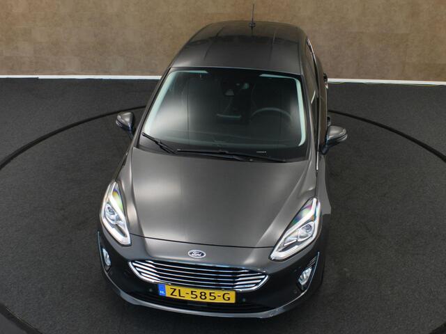 Ford FIESTA 1.0 EcoBoost Titanium - ORIGINEEL NEDERLANDSE AUTO - AFKOMSTIG VAN 1E EIGENAAR - CAMERA - PARKEERSENSOREN VOOR/ ACHTER - NAVIGATIE - CLIMATE CONTROL - 4 SEIZOENENBANDEN - DAB RADIO - PARKEERASSISTENT - VOORRUITVERWARMING - B&O AUDIOSYSTEEM - ELEKTRISCH IN