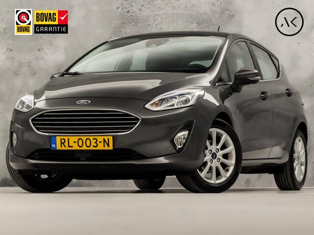 Ford FIESTA 1.0 EcoBoost Titanium (APPLE CARPLAY, GROOT NAVI, BANG&OLUFSEN, STUUR/STOELVERWARMING, CAMERA, SPORTSTOELEN, ADAPTIVE CRUISE, LM VELGEN, NIEUWSTAAT)