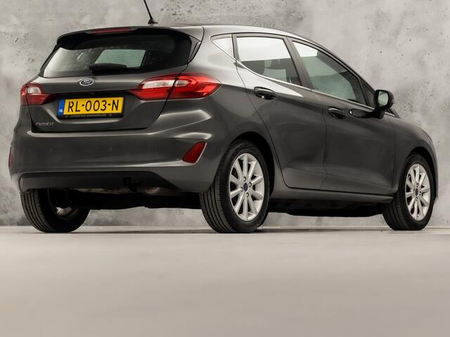 Ford FIESTA 1.0 EcoBoost Titanium (APPLE CARPLAY, GROOT NAVI, BANG&OLUFSEN, STUUR/STOELVERWARMING, CAMERA, SPORTSTOELEN, ADAPTIVE CRUISE, LM VELGEN, NIEUWSTAAT)