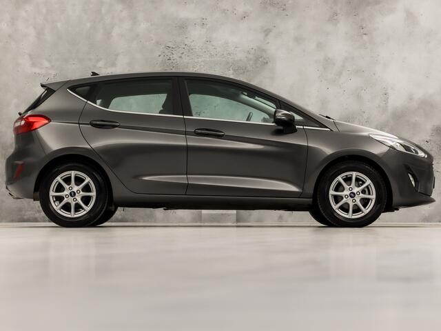 Ford FIESTA 1.0 EcoBoost Titanium (APPLE CARPLAY, GROOT NAVI, CLIMATE, SPORTSTOELEN, LM VELGEN, PARKEERSENSOREN, NIEUWSTAAT)
