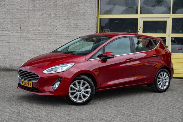 Ford FIESTA 1.0 EcoBoost 5drs Titanium BJ2020 Lmv 16" | Led V+A | Pdc | Verwarmde voorruit | Navi | Cruise control | Climate control | Sportstoelen | Verwarmd stuur | Verwarmde voorstoelen | Getint glas