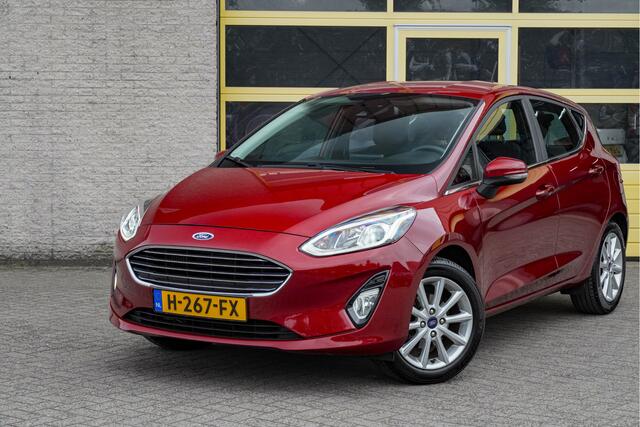 Ford FIESTA 1.0 EcoBoost 5drs Titanium BJ2020 Lmv 16" | Led V+A | Pdc | Verwarmde voorruit | Navi | Cruise control | Climate control | Sportstoelen | Verwarmd stuur | Verwarmde voorstoelen | Getint glas