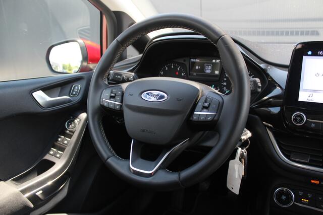 Ford FIESTA 1.0 EcoBoost Titanium | Incl. 12 maanden garantie | Parkeersensoren | Bluetooth | Cruise control | Climate control | Lane assist | Airco | Lichtmetalen velgen