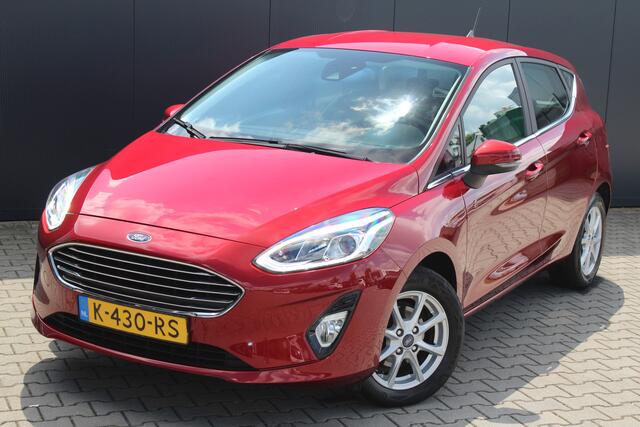 Ford FIESTA 1.0 EcoBoost Titanium | Incl. 12 maanden garantie | Parkeersensoren | Bluetooth | Cruise control | Climate control | Lane assist | Airco | Lichtmetalen velgen