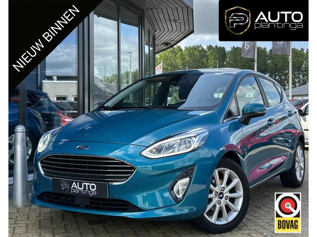 Ford FIESTA 1.0 EcoBoost Titanium 101PK | LUXE | Achteruitrijcamera | B&O Audio | Climate Control | Navigatie | Adaptive Cruise Control | Voorruitverwarming | Parkeersensoren Voor en Achter | Lichtmetalen Velgen | 2 Sleutels | DAB+ | NAP |