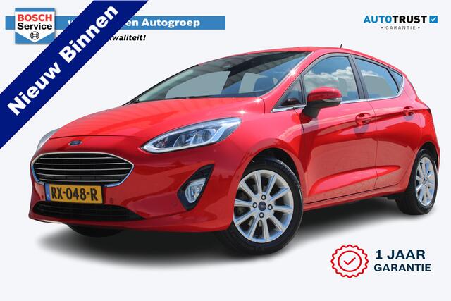 Ford FIESTA 1.0 EcoBoost Titanium | Incl. 12 maanden garantie | Cruise control | Climate control | Parkeersensoren v+a | Achteruitrijcamera | Stuur / Stoelverwarming | 100% onderhouden | Regensensor | Ford Sync | mistlampen voor | Voorruitverwarming |