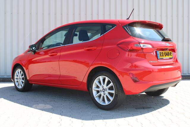 Ford FIESTA 1.0 EcoBoost Titanium | Incl. 12 maanden garantie | Cruise control | Climate control | Parkeersensoren v+a | Achteruitrijcamera | Stuur / Stoelverwarming | 100% onderhouden | Regensensor | Ford Sync | mistlampen voor | Voorruitverwarming |