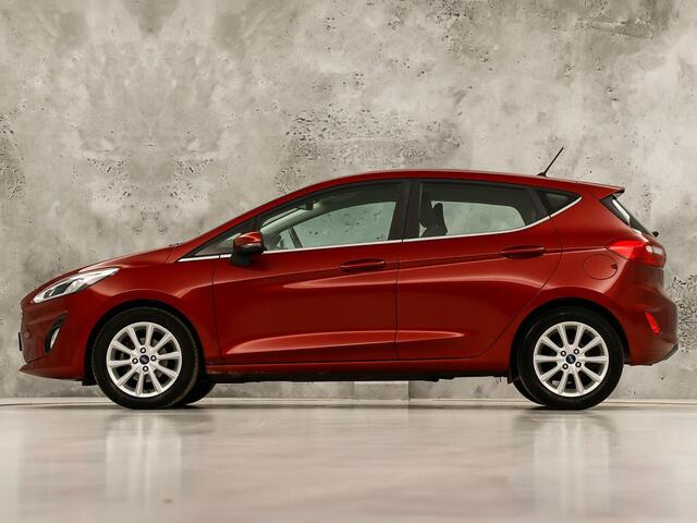 Ford FIESTA 1.0 EcoBoost Titanium (APPLE CARPLAY, GROOT NAVI, CLIMATE, CAMERA, KEYLESS, SPORTSTOELEN, ADAPTIVE CRUISE, LM VELGEN, NIEUWSTAAT)