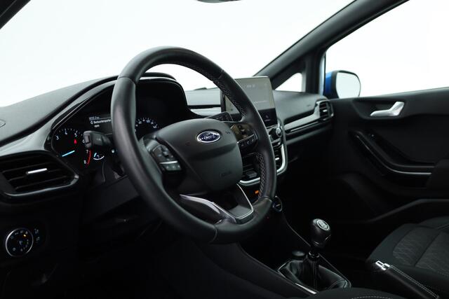 Ford FIESTA 1.0 EcoBoost Hybrid Active X | Rijklaar! | Trekhaak | WinterPack | E-Spiegels | Cruise | PDC | Climate | App.Connect | Rijmodi | LED | Bluetooth | 5-Deurs | 17'' V