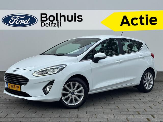 Ford FIESTA EcoBoost 100pk Titanium | Verwarmde voorruit | Camera | Navi | Cruise | All Season | Apple Carplay | Parkeersensoren |
