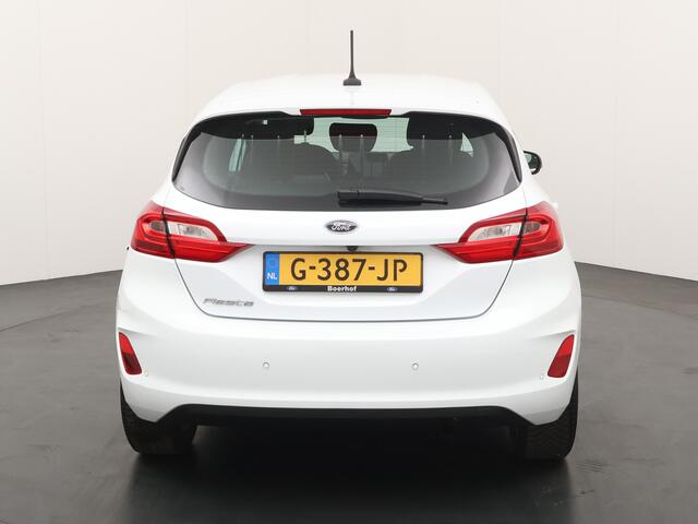 Ford FIESTA EcoBoost 100pk Titanium | Verwarmde voorruit | Camera | Navi | Cruise | All Season | Apple Carplay | Parkeersensoren |
