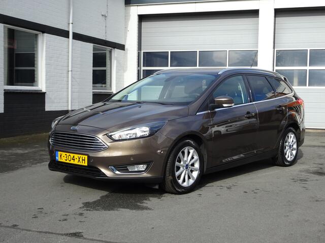 Ford FOCUS Wagon 1.0 Titanium Automatische airco, navigatie, cruise controle, licht metalen velgen, parkeersensoren voor en achter, stoelverwarming, stuurwiel verwarming, enz.