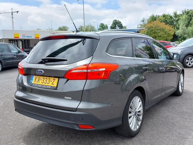 Ford FOCUS Wagon 1.0 EcoBoost 125pk Titanium | Origineel NL | Navi | Apple Carplay+Android Auto | Bi-Xenon | SONY Sound | Clima | Cruise | Keyless Entry | Pdc V+A+Assist+Camera | Privacy Glass | 17''lm