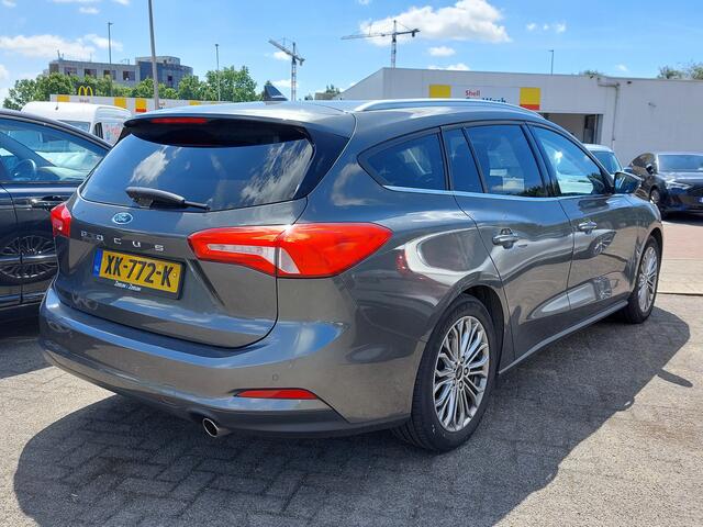 Ford FOCUS Wagon 1.0 EcoBoost 125pk Titanium Business | Navi | Apple Carplay+Android Auto | Clima | Adap.Cruise | Led Koplampen | Keyless Entry | Pdc V+A | Rijstrook+Licht+Regensensor | Privacy Glass | 17''lm