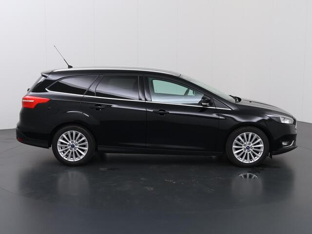 Ford FOCUS Wagon 1.0 Titanium | Trekhaak | Navigatie | Voorruitverwarming | Parkeersensoren | Cruise Control | Climate Control |