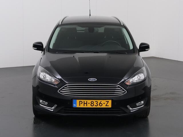 Ford FOCUS Wagon 1.0 Titanium | Trekhaak | Navigatie | Voorruitverwarming | Parkeersensoren | Cruise Control | Climate Control |