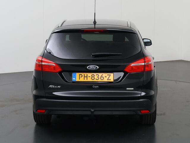Ford FOCUS Wagon 1.0 Titanium | Trekhaak | Navigatie | Voorruitverwarming | Parkeersensoren | Cruise Control | Climate Control |