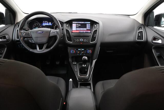 Ford FOCUS Wagon 1.0 Titanium | Trekhaak | Navigatie | Voorruitverwarming | Parkeersensoren | Cruise Control | Climate Control |
