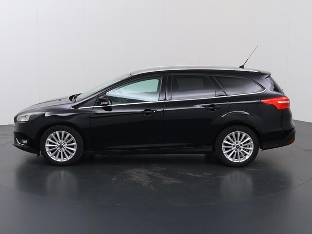 Ford FOCUS Wagon 1.0 Titanium | Trekhaak | Navigatie | Voorruitverwarming | Parkeersensoren | Cruise Control | Climate Control |