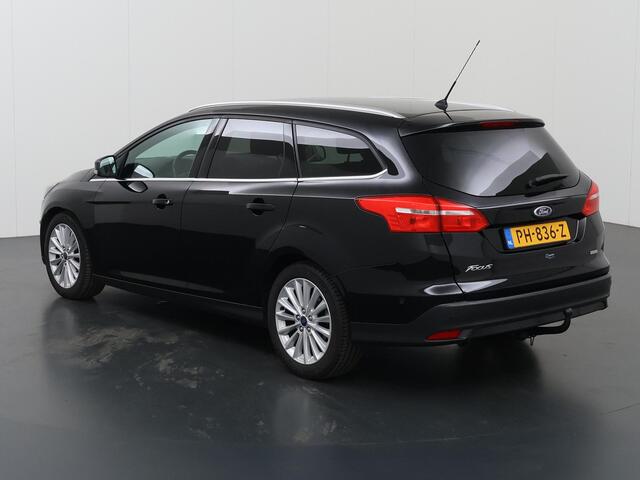 Ford FOCUS Wagon 1.0 Titanium | Trekhaak | Navigatie | Voorruitverwarming | Parkeersensoren | Cruise Control | Climate Control |