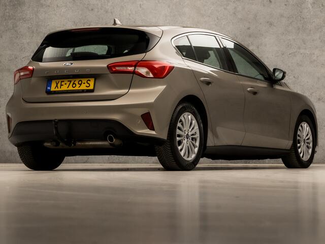 Ford FOCUS 1.0 EcoBoost Titanium Business Automaat (APPLE CARPLAY, GROOT NAVI, STUUR/STOELVERWARMING, ADAPTIVE CRUISE, SPORTSTOELEN, CLIMATE, TREKHAAK, GETINT GLAS, CAMERA, NIEUWE APK, NIEUWSTAAT)