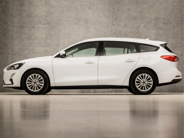 Ford FOCUS Wagon 1.0 EcoBoost Titanium Business Automaat (APPLE CARPLAY, GROOT NAVI, STUUR/STOELVERWARMING, PARKEERSENSOREN, SPORTSTOELEN, CRUISE, DAB+, LED KOPLAMPEN, NIEUWE APK, NIEUWSTAAT)