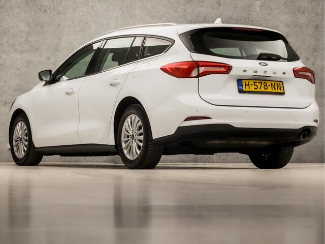 Ford FOCUS Wagon 1.0 EcoBoost Titanium Business Automaat (APPLE CARPLAY, GROOT NAVI, STUUR/STOELVERWARMING, PARKEERSENSOREN, SPORTSTOELEN, CRUISE, DAB+, LED KOPLAMPEN, NIEUWE APK, NIEUWSTAAT)