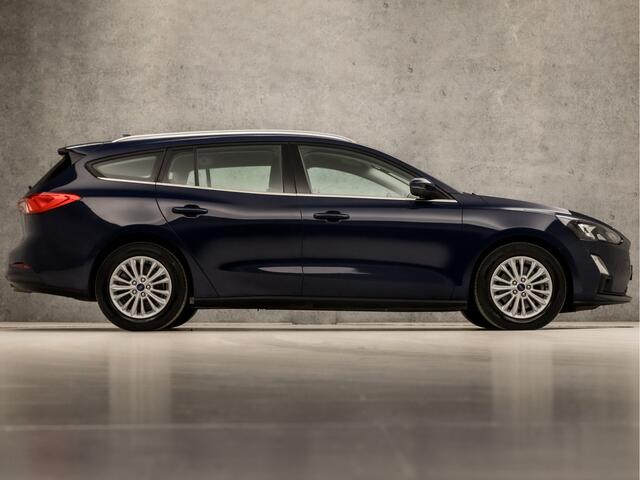 Ford FOCUS Wagon 1.0 EcoBoost Titanium (APPLE CARPLAY, GROOT NAVI, CLIMATE, ADAPTIVE CRUISE, SPORTSTOELEN, KEYLESS, PARKEERSENSOREN, LM VELGEN, LED KOPLAMPEN, NIEUWE APK, NIEUWSTAAT)
