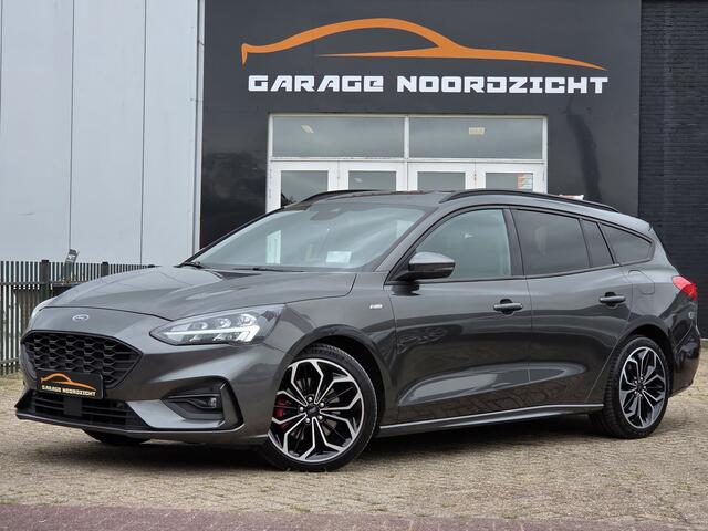 Ford FOCUS Wagon 1.0 EcoBoost ST Line AUTOMAAT|NAVIGATIE|HEAD-UP DISPLAY|LED KOPLAMPEN|STOELVERWARMING+STUUR|GETINT GLAS|18 INCH|DEALER ONDERHOUDEN Maandag tot Vrijdag geopend van 09.00 tot 20.00 uur geopend en Zaterdag van 09.00 tot 18.00 uur