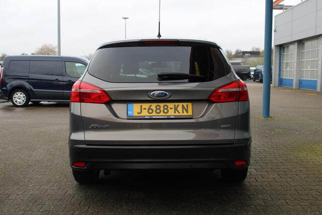 Ford FOCUS Wagon 1.0 Titanium | Automaat | Climate Control | Stoelverwarming | Navigatie | Parkeersensoren | Lichtmetalen Velgen |