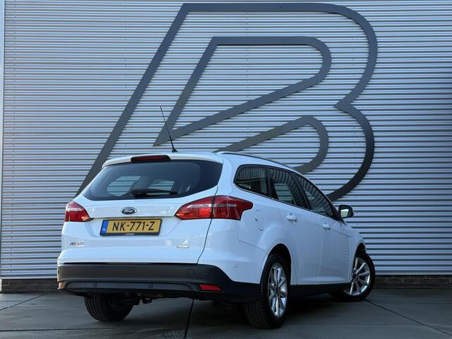 Ford FOCUS Wagon 1.0 Titanium 1e Eigenaar,Navi,Clima,Cruise,PDC V+A,Dealer Onderhouden,6-Bak,N.A.P,APK tot 04-2026