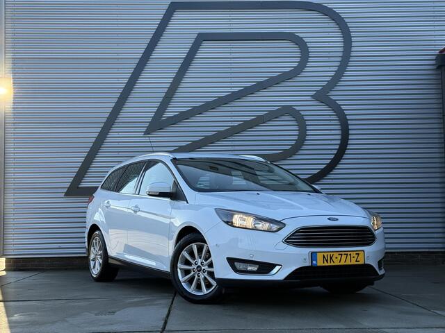 Ford FOCUS Wagon 1.0 Titanium 1e Eigenaar,Navi,Clima,Cruise,PDC V+A,Dealer Onderhouden,6-Bak,N.A.P,APK tot 04-2026