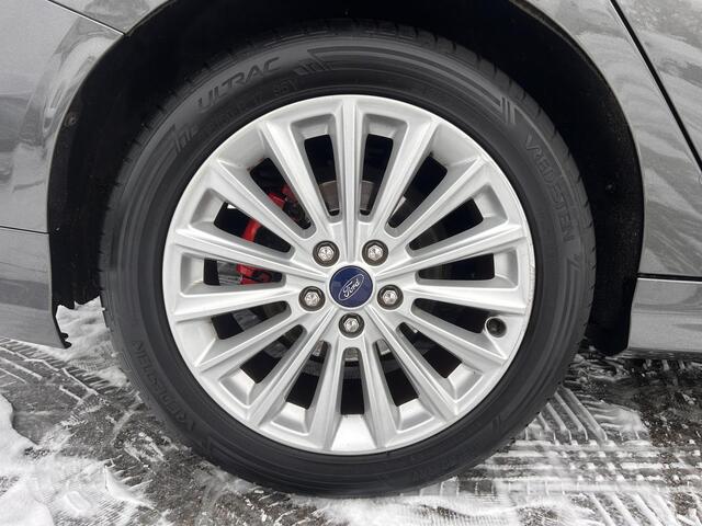 Ford FOCUS Wagon 1.0 Titanium /airco/navi/adaptieve cruise control/stoelverwarming/goed onderhouden occasion