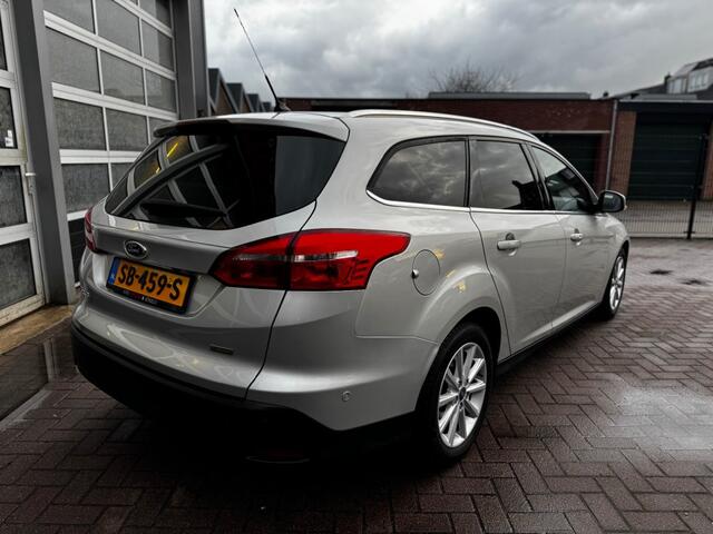 Ford FOCUS 1.0 TITANIUM / CAMERA / PDC / NAVI / CRUISE / LEER / STOEL-STUURVER.
