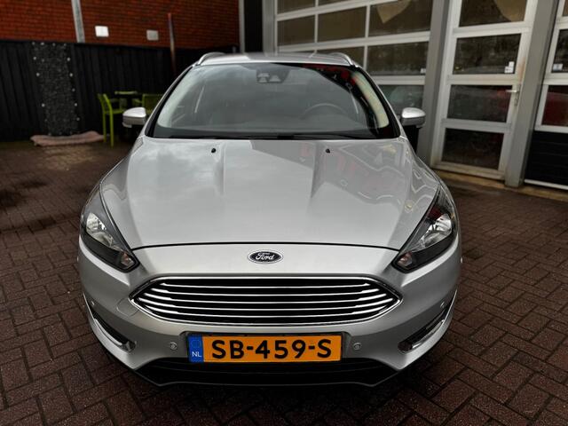 Ford FOCUS 1.0 TITANIUM / CAMERA / PDC / NAVI / CRUISE / LEER / STOEL-STUURVER.
