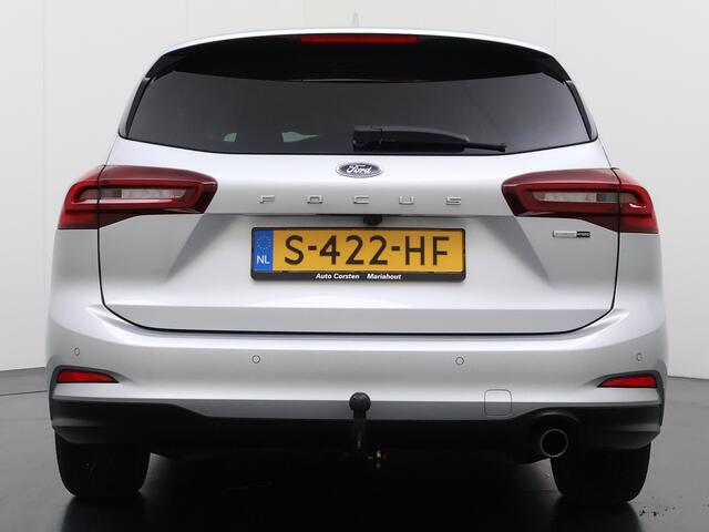 Ford FOCUS Wagon T 125PK Hybride Trekhaak Navi Camera LED Dual-ECC Keyless FordPass-ConnectStoel+Stuur+Voorruitverwarming Apple Carplay Android Auto Cruise Control Pdc Titanium Style DAB Bluetooth Lmv 17" Ecc GSM Draadloos Opladen Led Privacy Glas Isofix Lane Assist