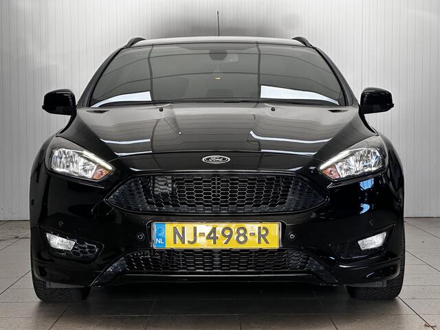 Ford FOCUS Wagon 1.0 ST-Line!/ Trekhaak/ 17'' LMV/ Apple + Android/ Navi/ Clima/ Cruise/ Elek. pakket/ Isofix/ Bluetooth/ Armsteun/ Multi. LEDER. Stuur/ Mistl./ PDC V+A/ Extra getint glas.