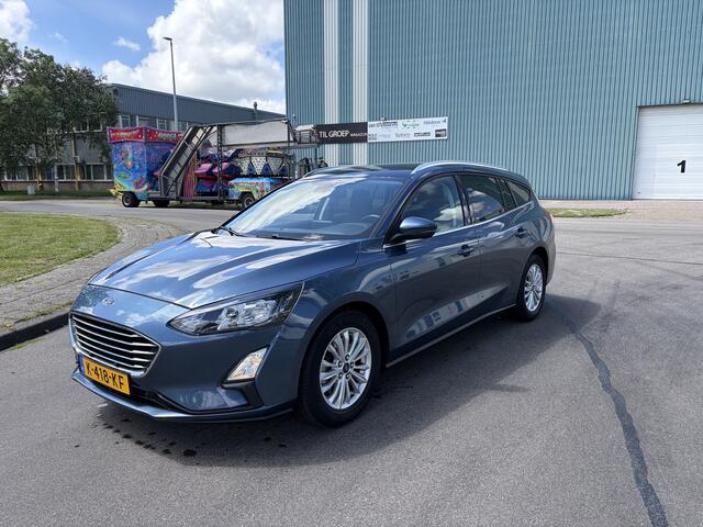 Ford FOCUS Wagon 1.0i EcoBoost Hybrid Titanium X Business 6-Bak 125 PK. Nieuwe auto en zeer zuinig !!! Open panoramadak !! Zeker een kansje deze auto !