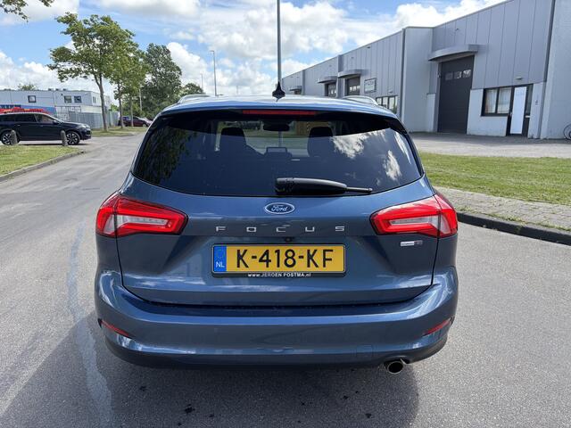 Ford FOCUS Wagon 1.0i EcoBoost Hybrid Titanium X Business 6-Bak 125 PK. Nieuwe auto en zeer zuinig !!! Open panoramadak !! Zeker een kansje deze auto !