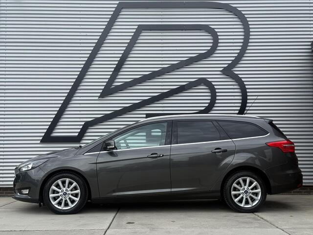 Ford FOCUS Wagon 1.0 Titanium 1e Eigenaar|Navi|Clima|Cruise|Carplay|Stoel+Stuur verw|PDC V+A|APK tot 12-2026