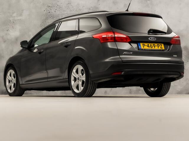 Ford FOCUS Wagon 1.0 Titanium Sport Automaat (NAVIGATIE, CLIMATE, STOELVERWARMING, GETINT GLAS, GETINT GLAS, SPORTSTOELEN, PARKEERSENSOREN, LM VELGEN, CRUISE, NIEUWE APK, NIEUWSTAAT)