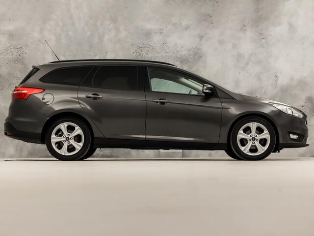 Ford FOCUS Wagon 1.0 Titanium Sport Automaat (NAVIGATIE, CLIMATE, STOELVERWARMING, GETINT GLAS, GETINT GLAS, SPORTSTOELEN, PARKEERSENSOREN, LM VELGEN, CRUISE, NIEUWE APK, NIEUWSTAAT)