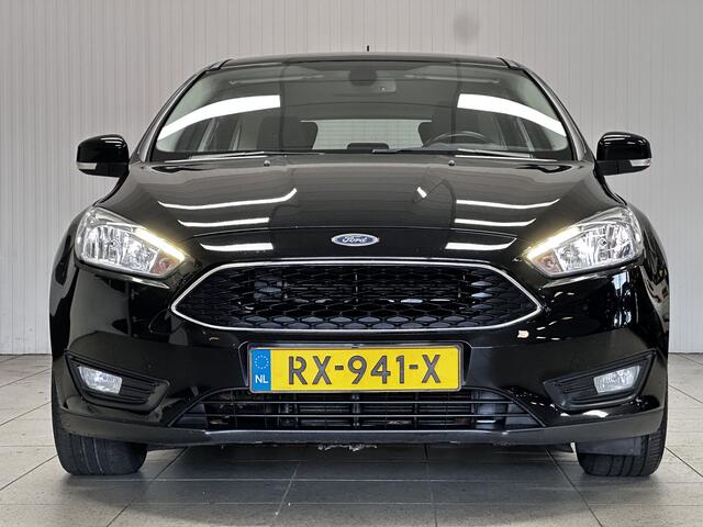 Ford FOCUS Wagon 1.0 Lease Edition/ Camera/ Apple + Android/ Navi/ Clima/ Cruise/ Elek. pakket/ Isofix/ Bluetooth/ Armsteun/ Multi. LEDER. Stuur/ 16'' LMV/ Mistl./ PDC.
