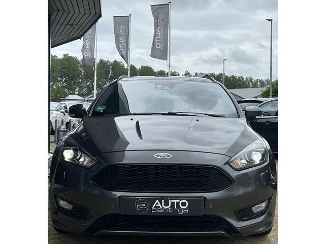 Ford FOCUS Wagon 1.5 ST-Line | SPORT | 150PK | Trekhaak | 1500KG Trekgewicht | Stoelverwarming | Stuurverwarming | Voorruitverwarming | Achteruitrijcamera | Parkeersensoren | Privacy Glass | Climate Control | 18 Inch | 2 Sleutels |