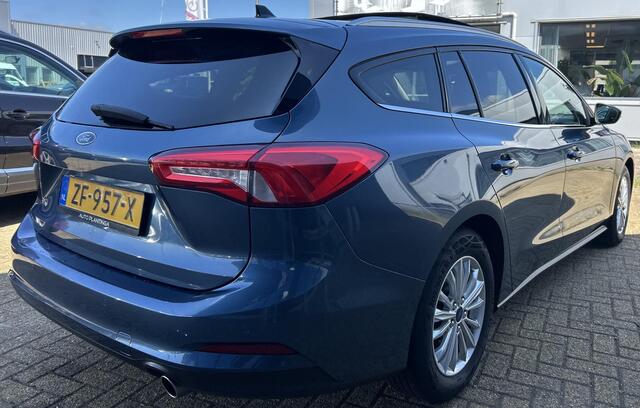 Ford FOCUS Wagon 1.0 EcoBoost Titanium Business 125PK | PANO | 2e Eigenaar | NL AUTO | Onderhoudshistorie | NAP | Elektrische Achterklep | Parkeersensoren | Winter Pack | Stoel Stuur en Voorruitverwarming | Climate Control | Cruise Control | Navigatie | Carplay | 2