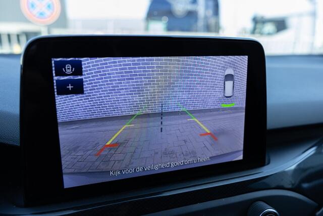Ford FOCUS Wagon 1.0 EcoBoost Hybrid 125 ST Line X Business | Achteruitrijcamera | Parkeersensoren | Stoelverwarming | LED Koplampen | Climate Control | Cruise Control | Navigatie | Apple Carplay | Android Auto | Keyless Entry | Elektrische Achterklep