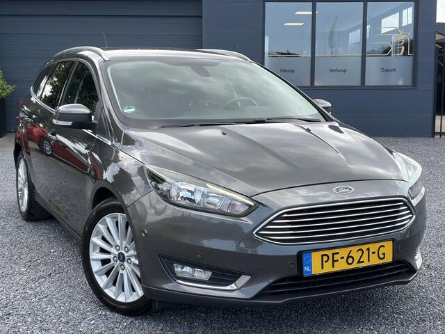 Ford FOCUS Wagon 1.0 Titanium 2e Eigenaar,Navi,Trekhaak,125pk,Clima,Cruise,Pdc V+A,6 Bak,Lm velgen,N.A.P,Apk tot 07-2027