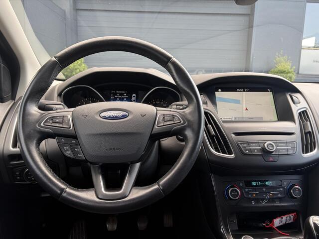 Ford FOCUS Wagon 1.0 Titanium 2e Eigenaar,Navi,Trekhaak,125pk,Clima,Cruise,Pdc V+A,6 Bak,Lm velgen,N.A.P,Apk tot 07-2027