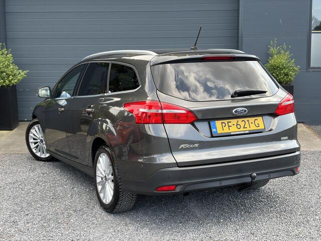 Ford FOCUS Wagon 1.0 Titanium 2e Eigenaar,Navi,Trekhaak,125pk,Clima,Cruise,Pdc V+A,6 Bak,Lm velgen,N.A.P,Apk tot 07-2027