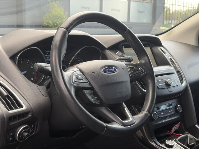 Ford FOCUS Wagon 1.0 Titanium 2e Eigenaar,Navi,Trekhaak,125pk,Clima,Cruise,Pdc V+A,6 Bak,Lm velgen,N.A.P,Apk tot 07-2027